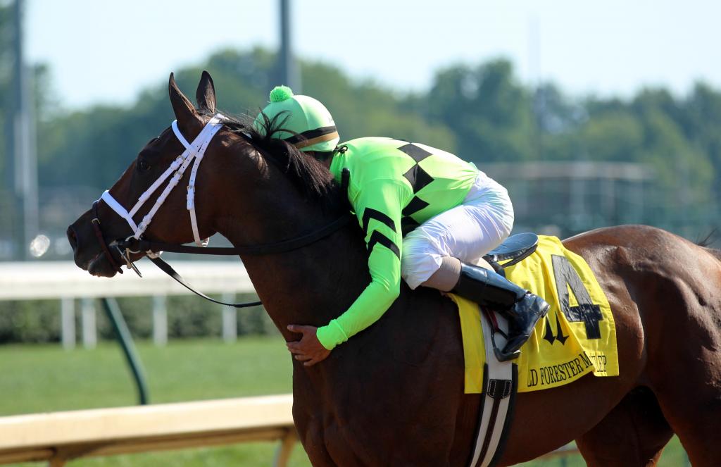 Cash Control gets a hug from her jockey. (Eclipse Sportswire)