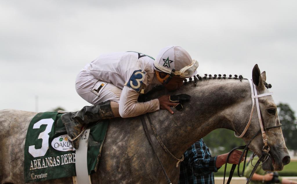 Creator gets a hug after his Arkansas Derby win. (Eclipse Sportswire)