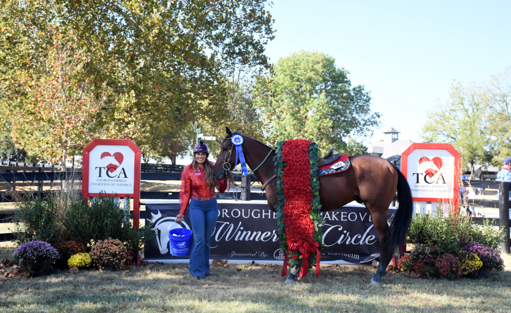 Fallon Taylor with 2019 Thoroughbred Makeover Champion Cowboy Swagger. (Melissa Bauer-Herzog/America's Best Racing)