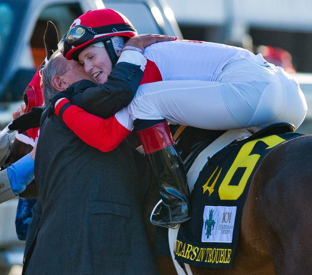 Owner Ken Ramsey gives Rosie Napravnik a hug after she wins the Louisiana Derby aboard Vicar's in Trouble. (Eclipse Sportswire)