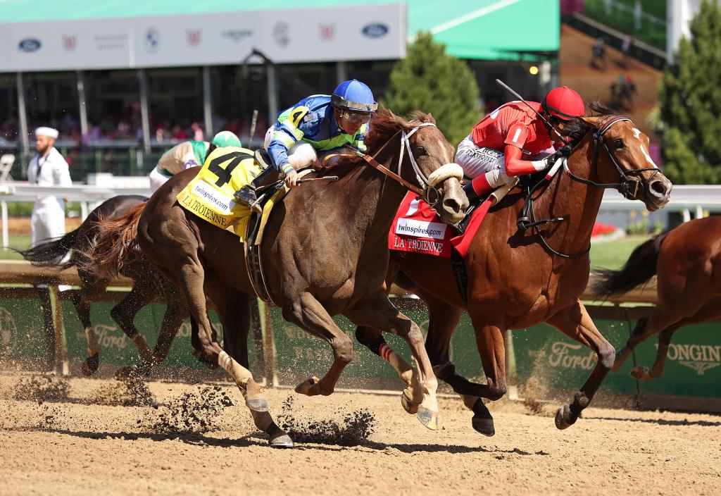 Played Hard, inside, held off last year's Kentucky Oaks winner Secret Oath to win the La Troienne Stakes Presented by Twinspires. (Eclipse Sportswire)
