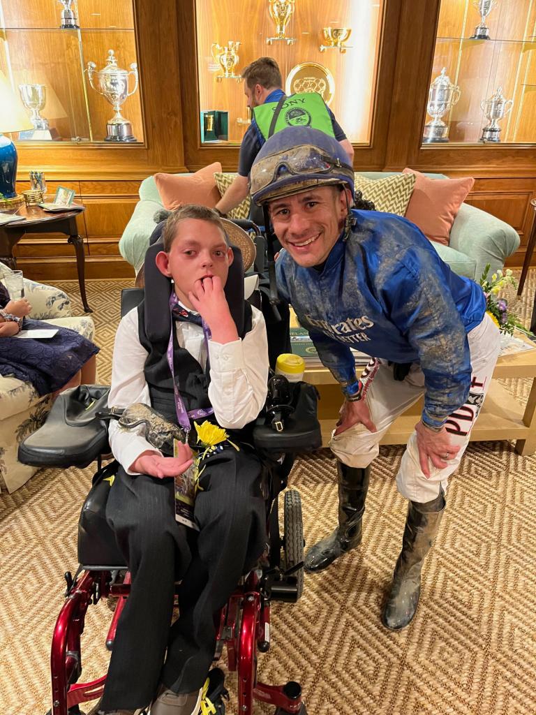 With Junior Alvarado, regular jockey for Cody’s Wish. (Courtesy of Kelly Dorman)