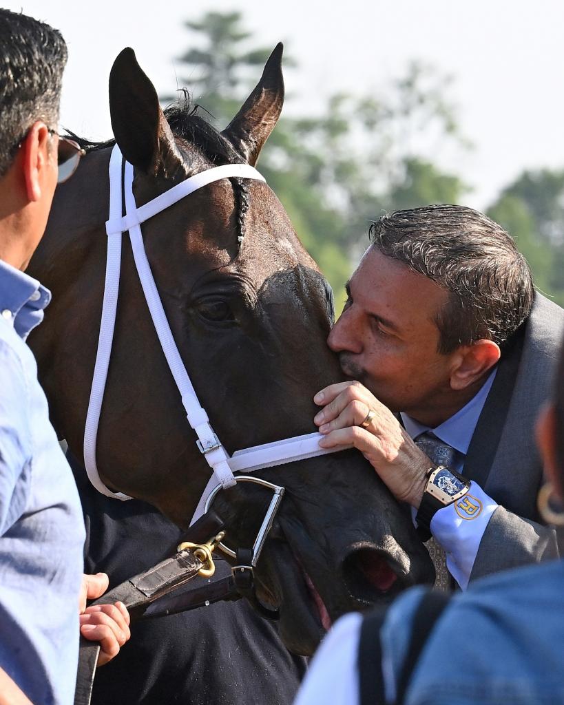 Fierceness gets a kiss from owner Mike Repole (Susie Raisher/NYRA)