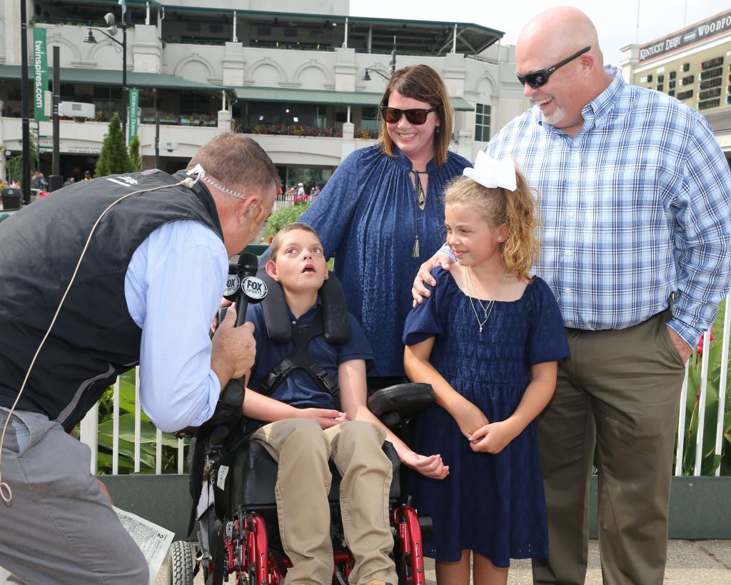 Frank Lyons interviews the Dormans. (Coady Photography)