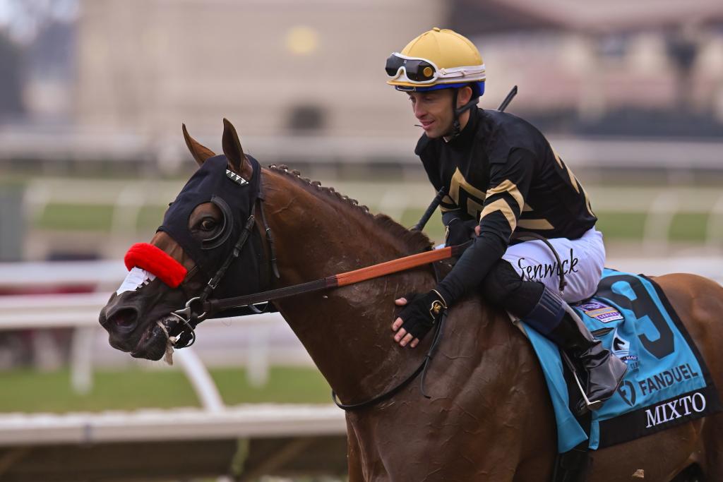 Mixto gets a pat from Kyle Frey after the Pacific Classic (Eclipse Sportswire)