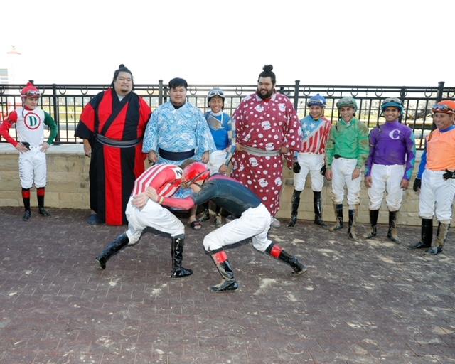 Winner’s circle becomes wrestling mat. (Coady Photography)