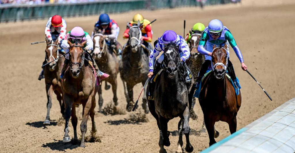 Red Carpet Ready, No. 6 in purple and white, won the $500,000 Eight Belles Stakes presented by Sysco for 3-year-old fillies on the Longines Kentucky Oaks undercard. (Eclipse Sportswire)