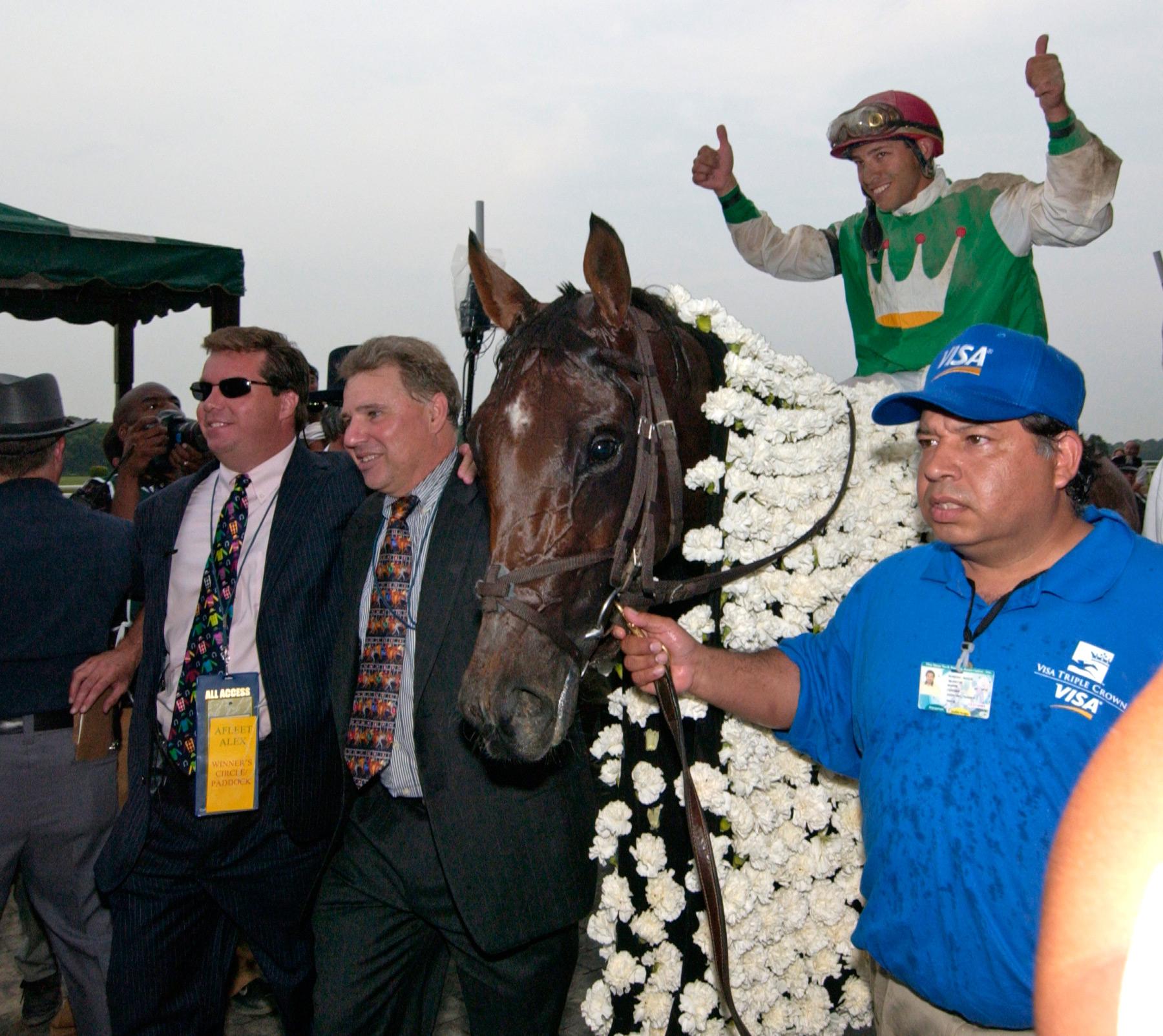 Afleet Alex enters the Belmont winner's circle.