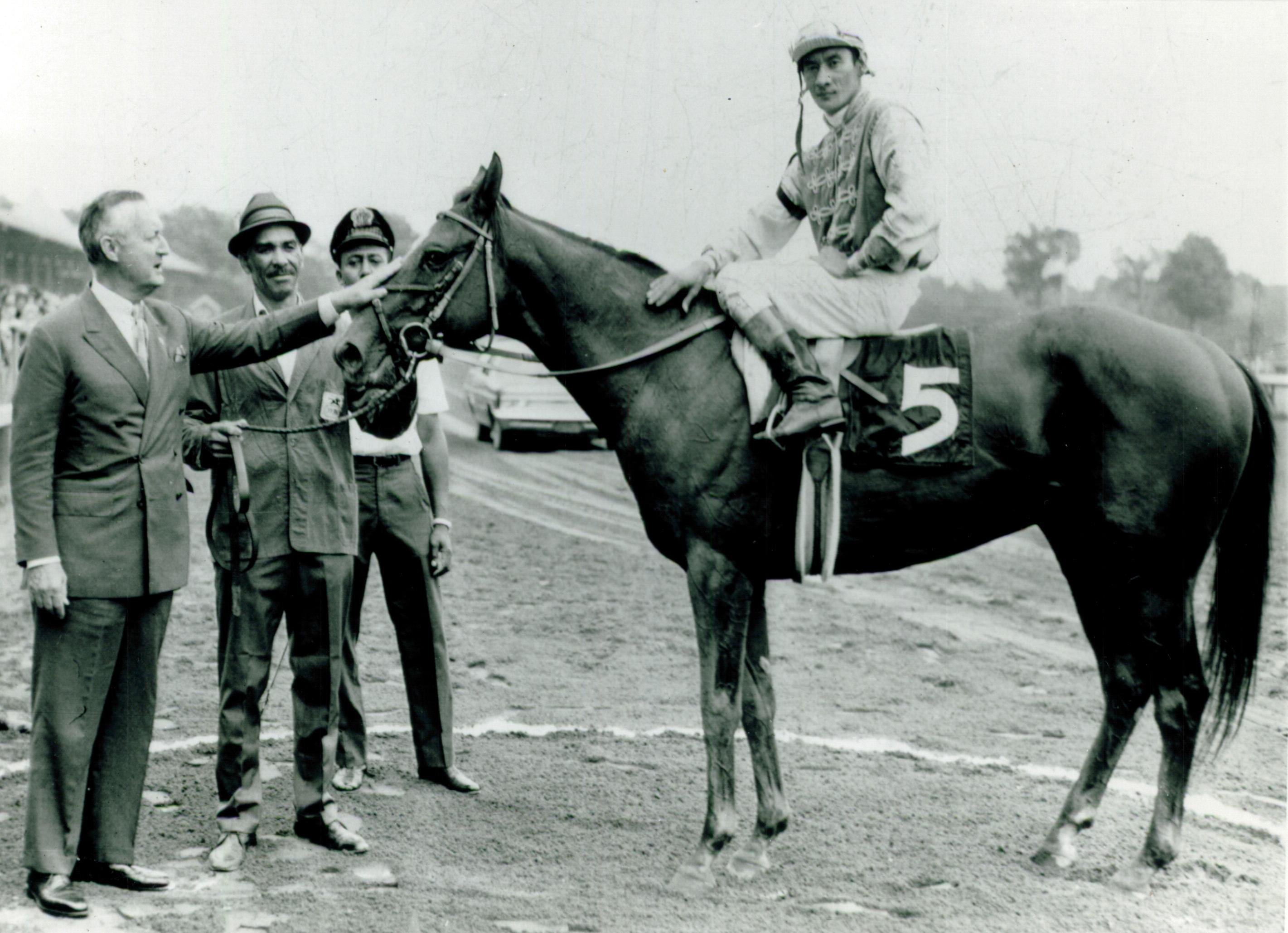 Arts and Letters and Braulio Baeza after winning the Travers.