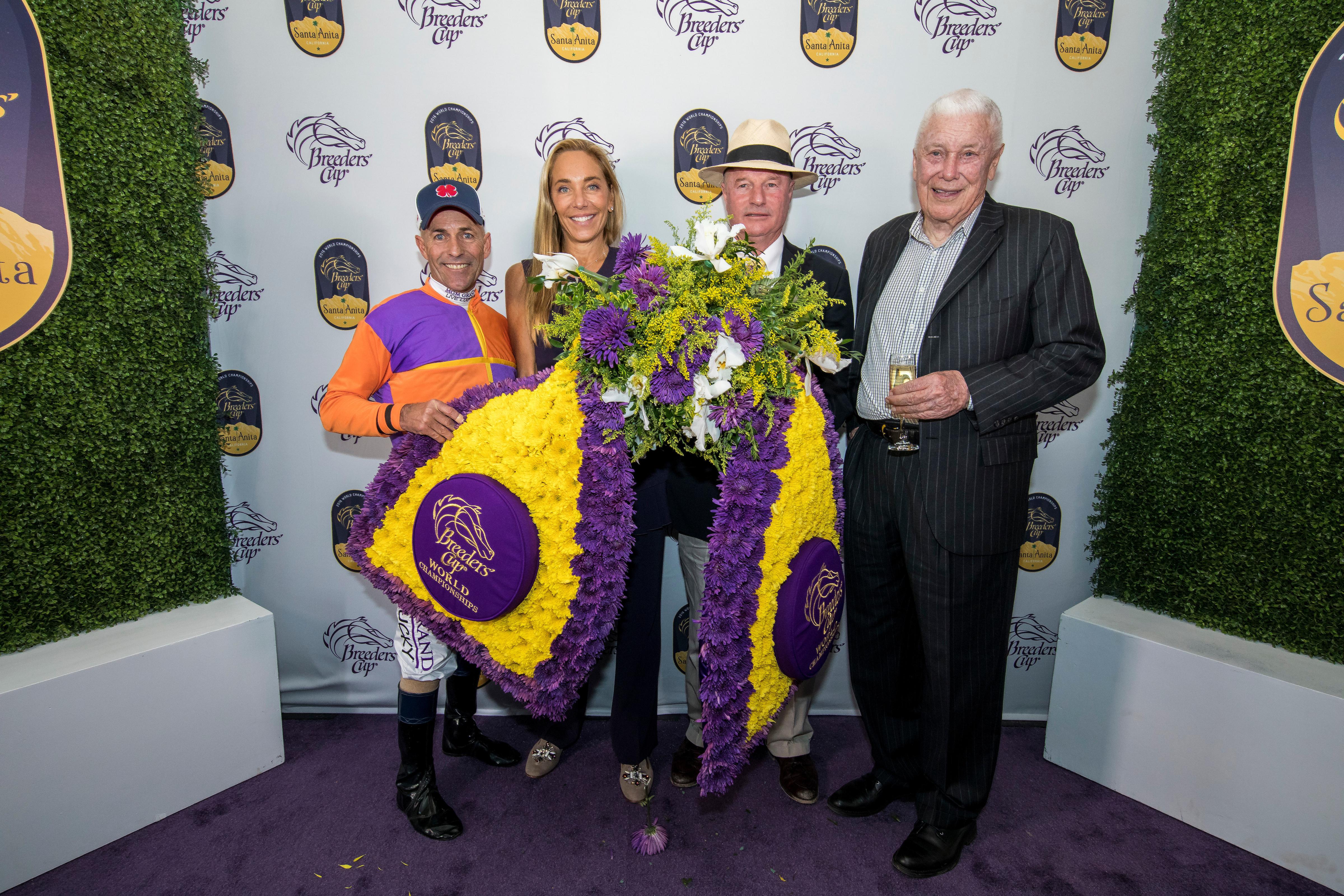 The connections of Beholder celebrate their 2016 Distaff win.