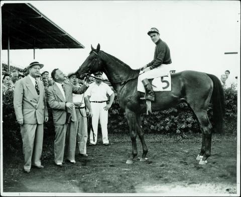 Citation and Snider after winning the Flamingo Stakes.