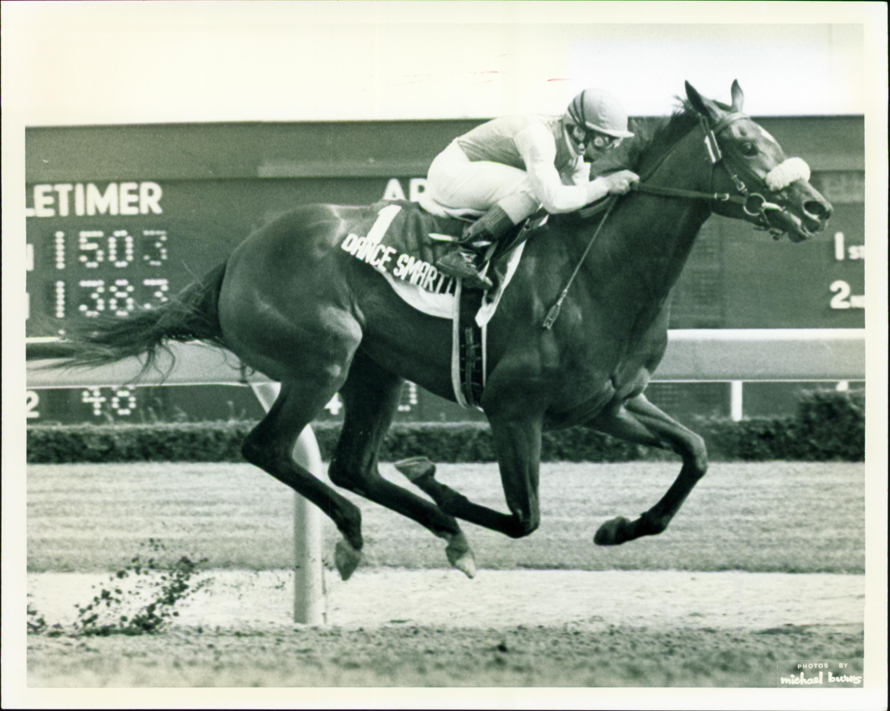 Dance Smartly wins the Canadian Oaks.
