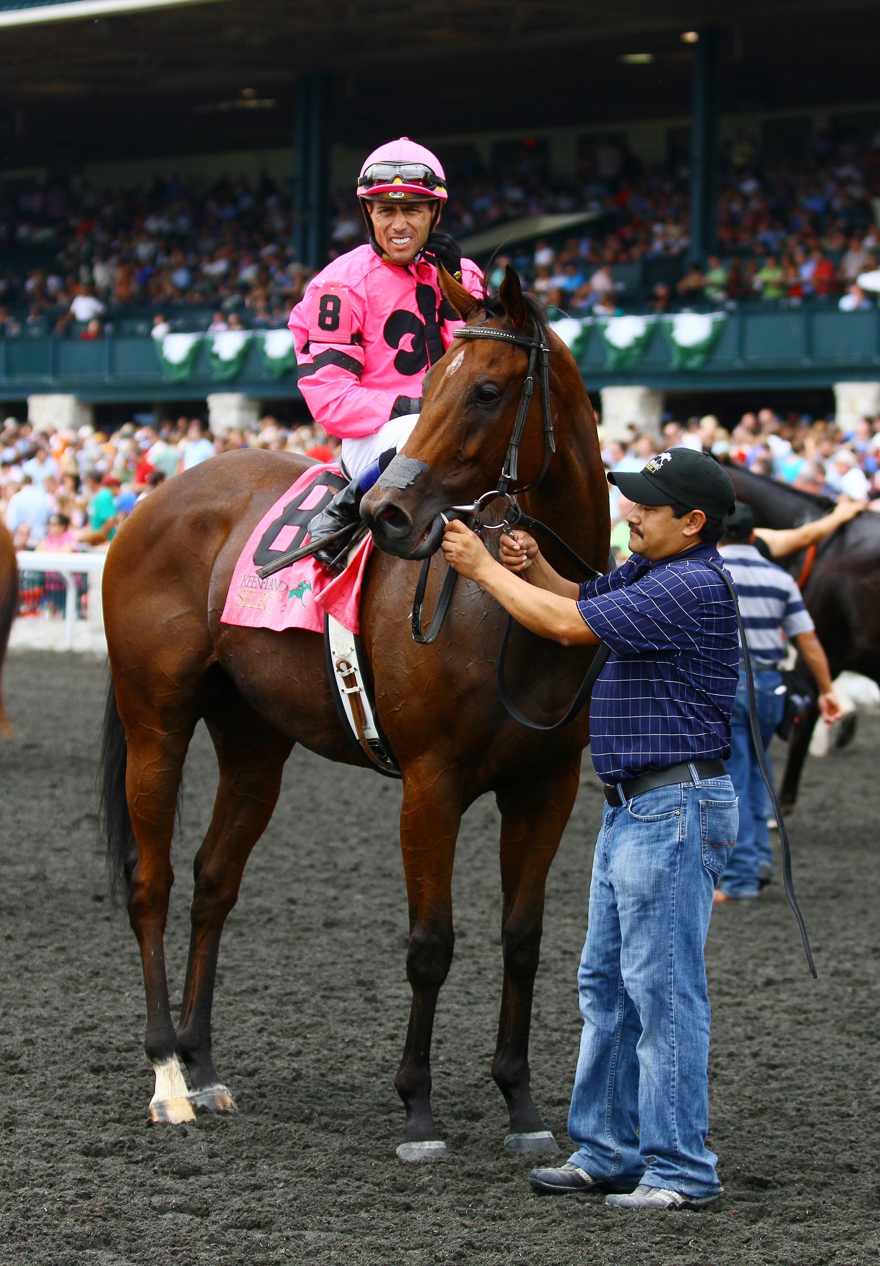 Gomez in 2013 after the final graded stakes win of his career, aboard Havelock.