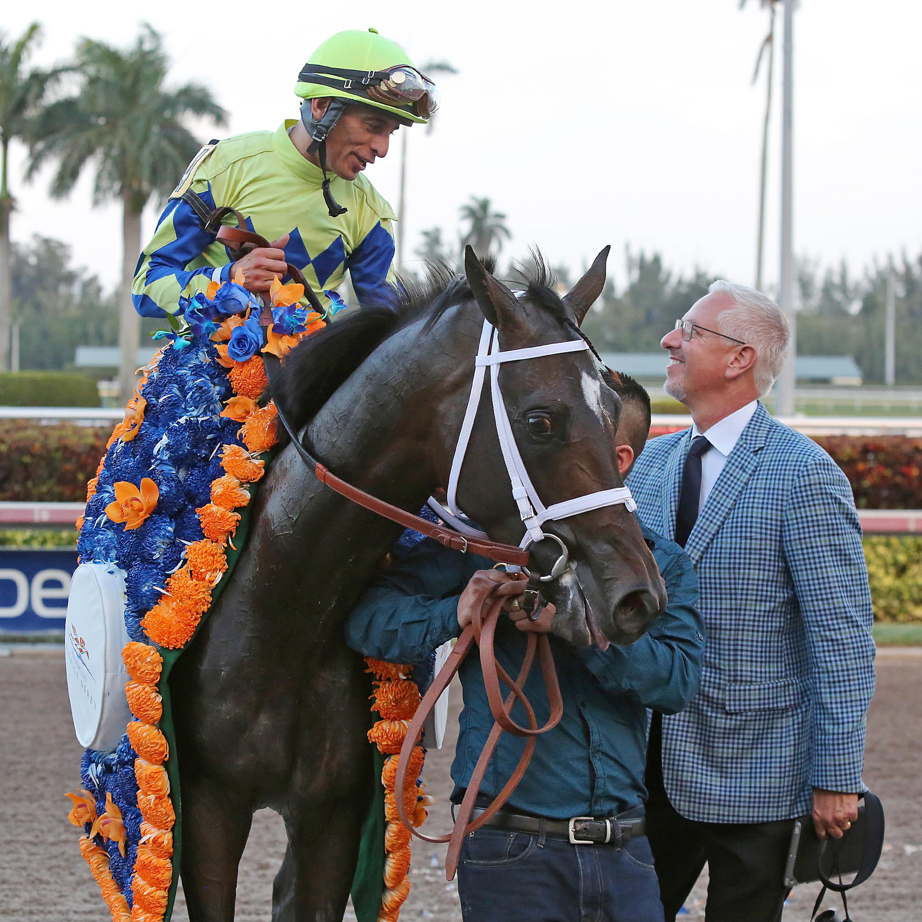 Todd Pletcher talks to John Velazquez after their Florida Derby win with Always Dreaming.