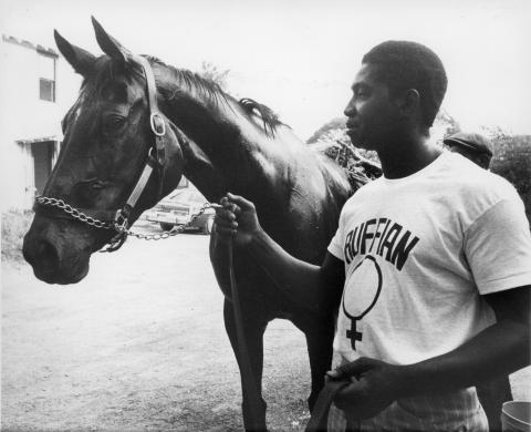 Ruffian and regular exercise rider John Truesdale at Belmont Park, 1975.