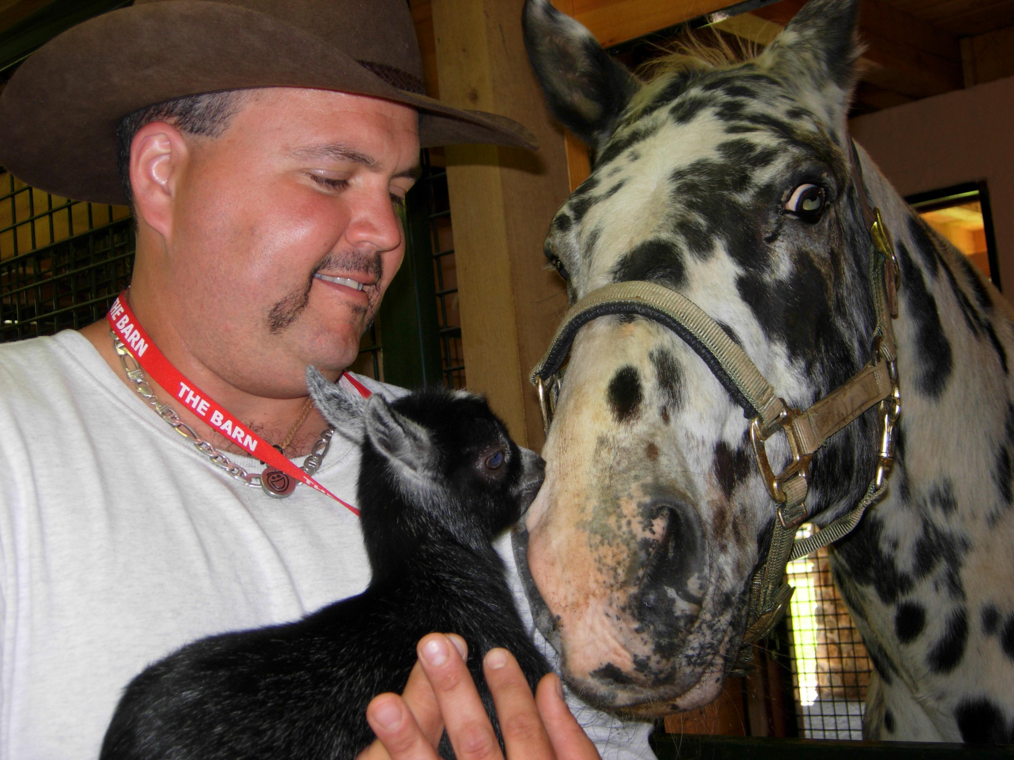 Thomas with a therapy horse.