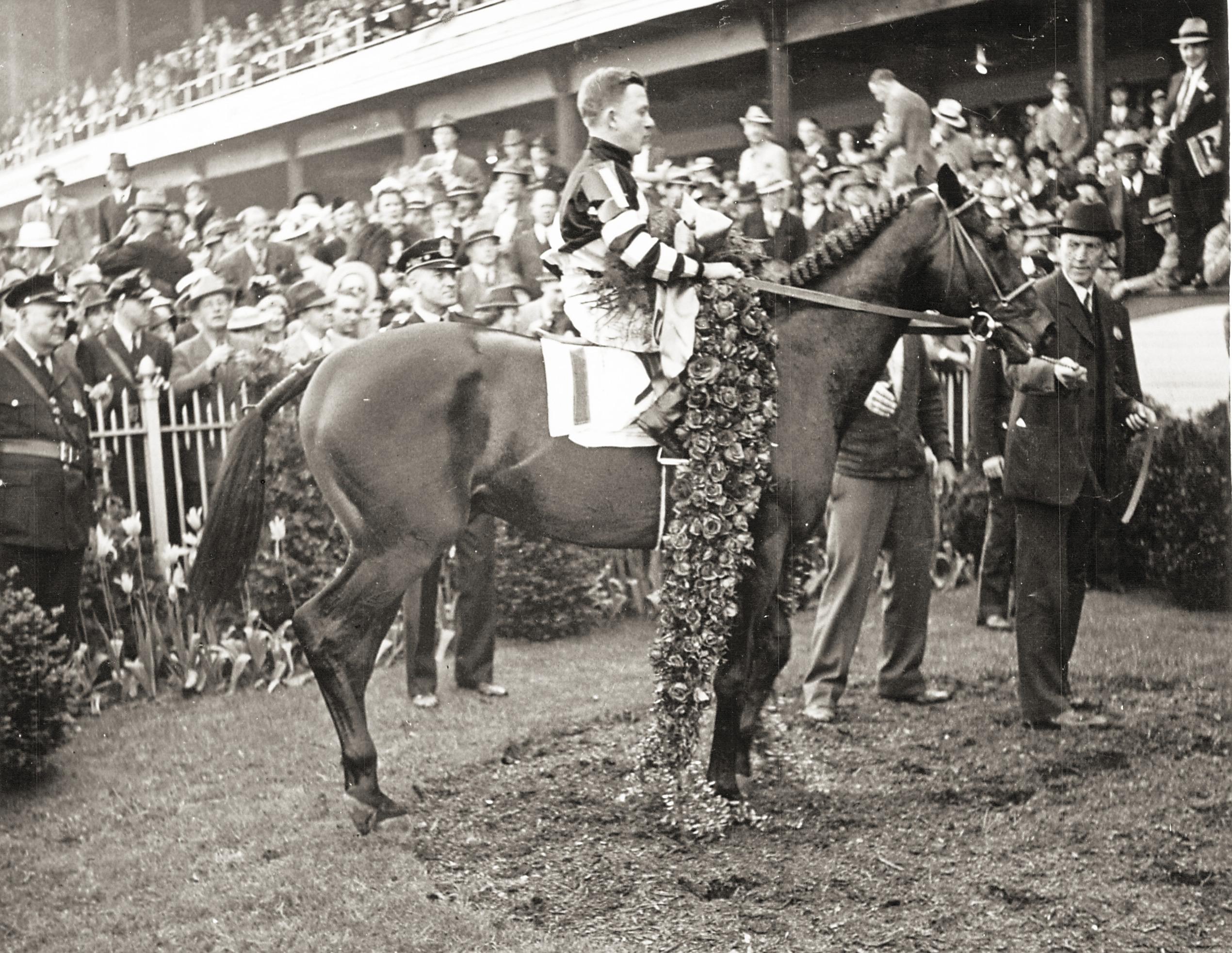 War Admiral after winning the 1937 Kentucky Derby.
