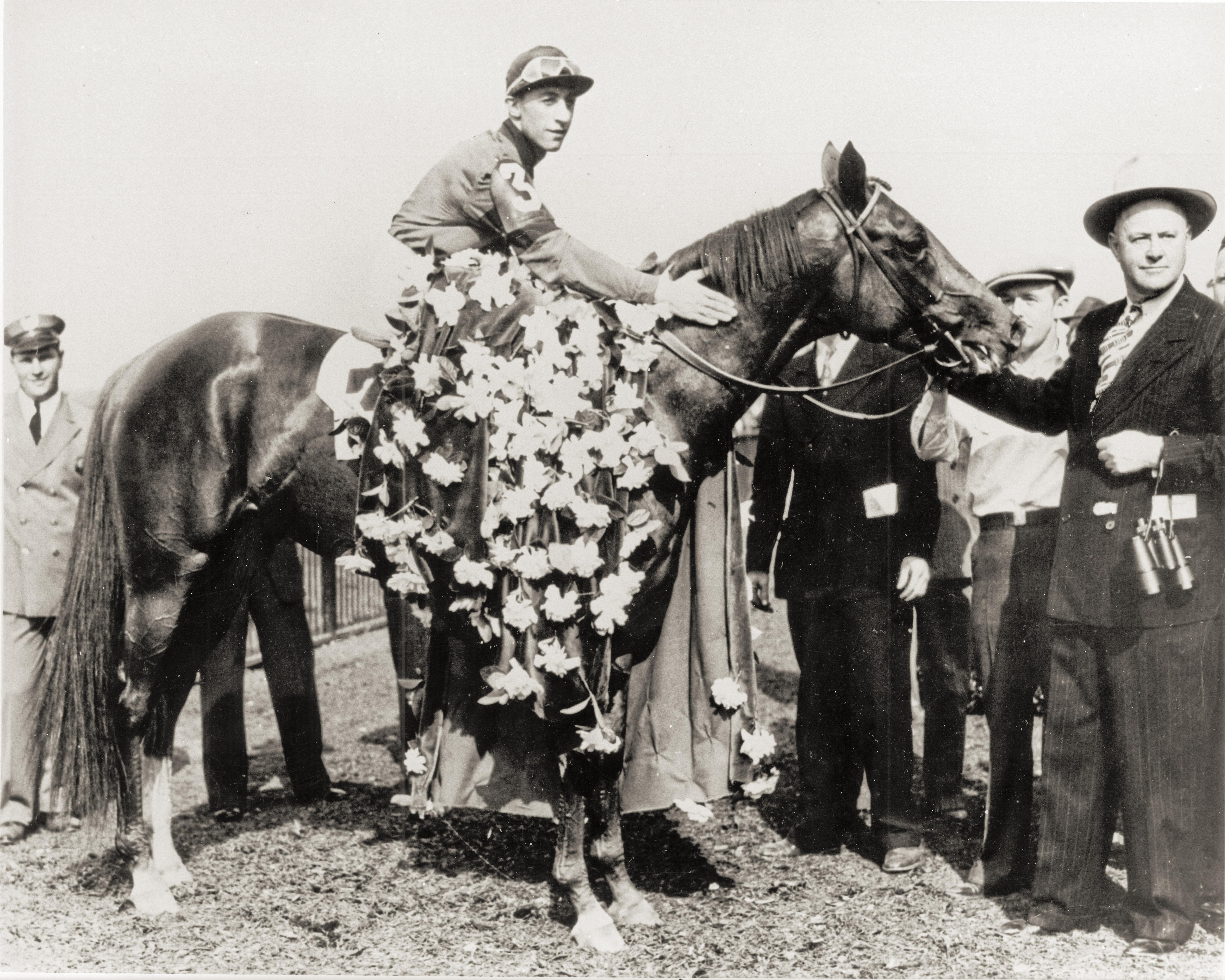Arcaro with Whirlaway in the Belmont Stakes winner's circle.