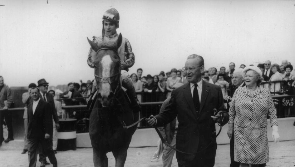 John Hay Whitney leads Stage Door Johnny into the 1968 Belmont Stakes winner's circle.