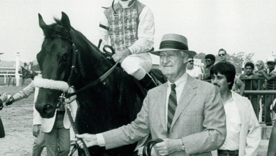 Paul Mellon, pictured leading Fit to Fight, was well known for his philanthropy as well as his Thoroughbreds.