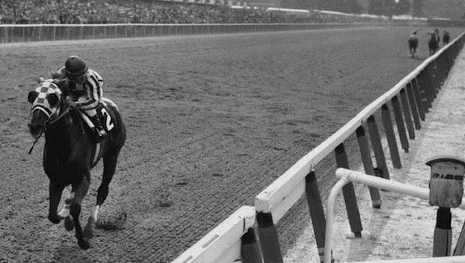 Secretariat wins the 1973 Belmont Stakes in an iconic performance.