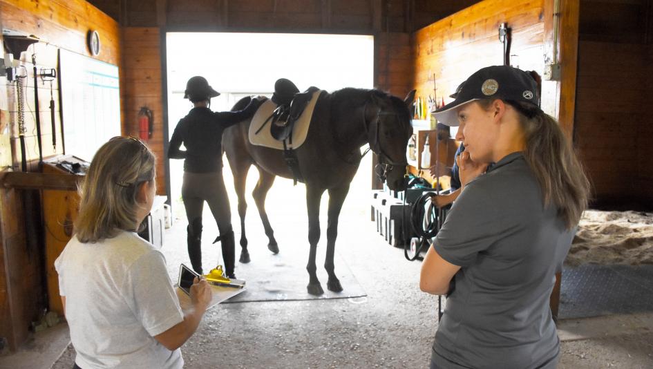 Suzie Oldham (left) inspects the Maker's Mark Secretariat Center for the Thoroughbred Aftercare Alliance. 