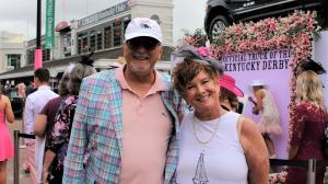 I love to wander through the crowds at the Kentucky Oaks and Derby to people-watch. I have a keen appreciation for fans who wear Derby-related clothing, equine jewelry, and whimsical hats. I noticed Libby Ludwig standing in line to have her photo taken at