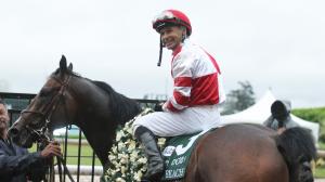 Jockey Mike Smith must choose between two Kentucky Derby horses in Omaha Beach (pictured) and Roadster.